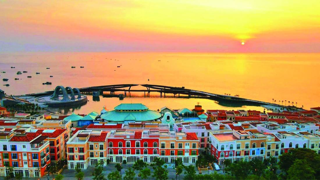 Sunset Town in Phu Quoc with colourful buildings and the Kissing Bridge